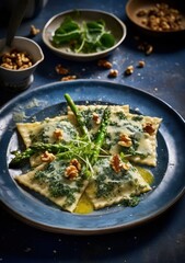 ravioli with asparagus with walnuts on a plate