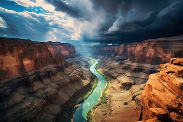 Dramatic monsoon clouds gathering over a canyon carved by a turquoise river