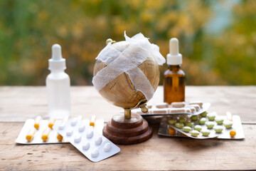 bandaged globe, planet sick concept, medicines and pills, planet sick concept, global warming,...