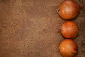 Onion on a wooden background