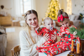 Mother, daughter and son on Christmas
