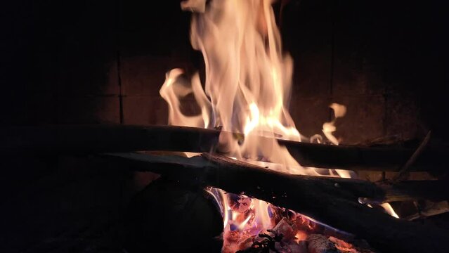 Experience the enchanting allure of a nighttime chiminea, where flames flicker in a dance of winter, Christmas, and spirituality. Slow-motion 4K footage at 120 frames per second captures the cozy magi