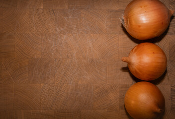 On aged wooden board: savory onion display