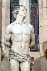 Chapel of S&atilde;o Sebasti&atilde;o with the stone statue in the Lisbon Cathedral.