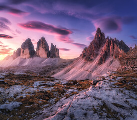 Alpine mountains at colorful sunset in autumn in Tre Cime, Dolomites, Italy. Colorful landscape...