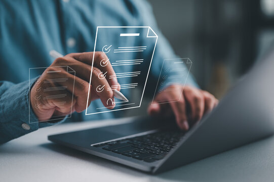 Electronic signature business concept. Businessman signs an electronic document, business approved, executing plan, project approved. Digital signature. Electronic documents, digital business, online.