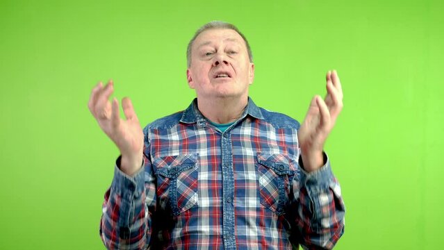 Spiritual senior man praying, looking upward and asking God why emotionally.