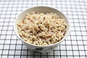 Cooked brown rice in bowl