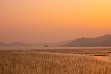 Obraz premium Shajiang Village, Shajiang Town, Xiapu County, Ningde City-Shajiang S Bay-Scenery of the fishing village beach facing the sky at sunset
