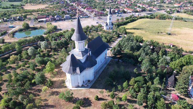 Aerial shot of Gai Monastery on a sunny summer day in Arad, Romania