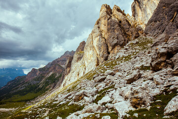 landscape with mountains, clouds and rocks