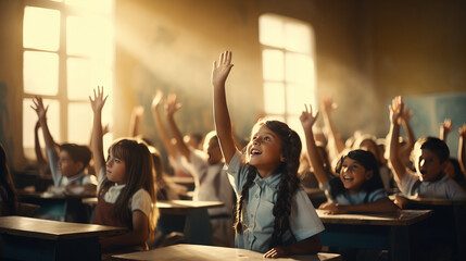 Children raise their hands to answer in the classroom. Back To School concept. Backdrop with selective focus. School restart
