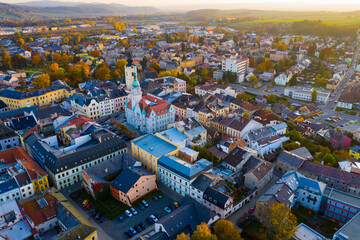 Scenic view from drone of historical center of Sumperk town in rays of autumn sun, Olomouc Region, Czech Republic - obrazy, fototapety, plakaty