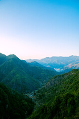 Nanxi River Scenic Area, Yongjia County, Wenzhou City, Zhejiang Province - the view of mountains facing the sky at sunset