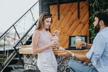 Successful Business Couple Discussing Ideas for Profit Growth in Urban Cafe