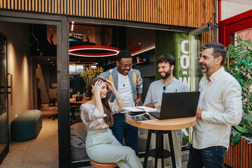 Dynamic Collaboration: Multiracial Team of Business Professionals Engaging in Creative...