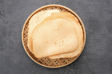 Kerupuk Udang, Crispy Prawn Crackers in white plate. 
