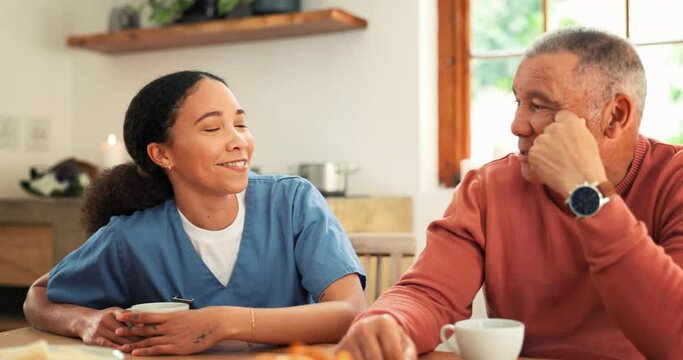 Caregiver, senior man and coffee with breakfast conversation, advice and happy for listening in nursing home. Nurse, elderly patient and relax with smile, drink or tea cup for talking in retirement