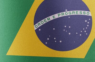 Brazil flag in green yellow and blue close-up, highlighting the pride of Brazilians in vivid fabric.