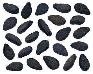 Falling black sesame seeds isolated on white background