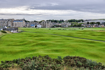 Fototapeta na wymiar St Andrews, Scotland - September 22, 2023: Early morning views of the Old Course in St Andrews Scotland 