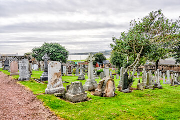 St Andrews, Scotland - September 22, 2023: The ruins of St Andrews Castle and cemetary in Scotland...