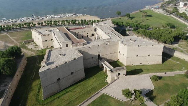 Aerial view, flight on Castello Svevo and Cathedral Basilica of Santa Maria Maggiore, Trani region, Barletta, Apulia, Italy, Europe