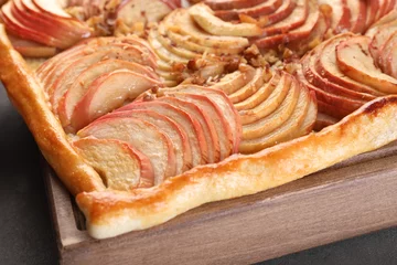 Fotobehang Tasty apple pie with nuts on table, closeup © New Africa