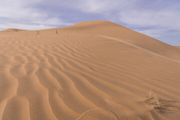 Fototapeta na wymiar Big dune and the sand texture at the foreground, Inner Mongolia, China