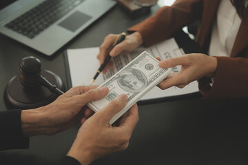 Business and lawyers discussing contract papers with brass scale on desk in office. Law, legal...