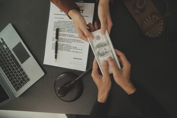 Business and lawyers discussing contract papers with brass scale on desk in office. Law, legal...