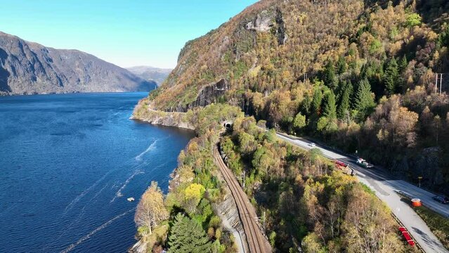 Road E16 and Railway Bergensbanen together towards Stanghelle, autumn aerial Norway