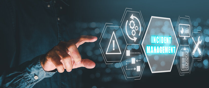 Incident management concept, Person hand touching incident management icon on virtual screen.