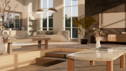 Copy space on a coffee table in a beautiful, modern spacious living room. close-up image