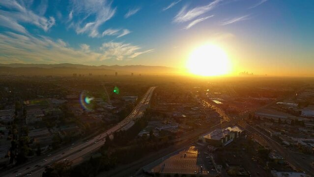 Aerial Time Lapse Forward Beautiful View Of City And Mountains Under Sky During Sunset - Culver City, California