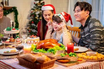Asian family's Christmas celebration in their home
