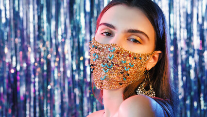 Quarantine party. Pandemic fashion. Sensual woman with festive makeup in creative gold chain face...