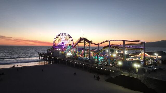 Santa Monica Pier At Los Angeles In California United States. Amusement Park Harbor Scenery. Ferris Wheel Landmark. Santa Monica Pier At Los Angeles In California United States. 