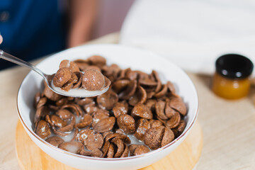 Sweet chocolate breakfast cereal flakes.