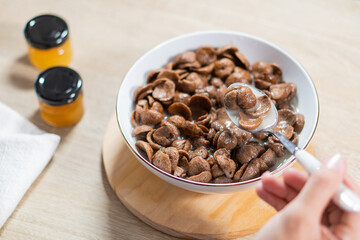 Sweet chocolate breakfast cereal flakes.