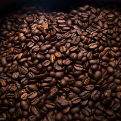 Brown Roasted pile of coffee beans, aroma, on Dark Background.