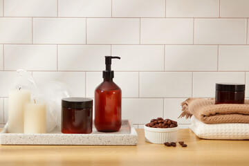Set of hair cosmetic bottles placed on marble tray with bathroom objects and coffee beans on ceramic background. Minimal scene for advertising and branding cosmetic product with space for design