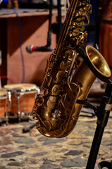 Saxophone in it's stand during a jazz concert