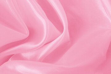 Pink fabric cloth texture for background and design art work, beautiful crumpled pattern of silk or linen.