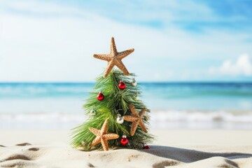 Christmas tree decorated on the sandy beach. 