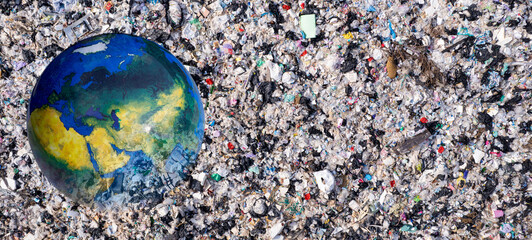 Aerial view, earth and piles of garbage, plastic bottles and garbage. waste sorting facility Concept of waste disposal and waste separation to preserve the environment and save the world.