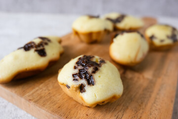 Kue cubit, a side snack from Jakarta, Indonesia. This cake got its name because the ripe cake was picked up with tongs by the seller, so it looked like it was being pinched.