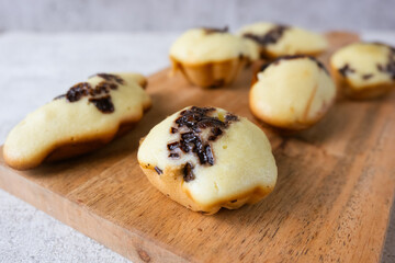 Kue cubit, a side snack from Jakarta, Indonesia. This cake got its name because the ripe cake was picked up with tongs by the seller, so it looked like it was being pinched.