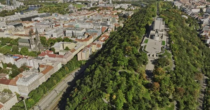 Prague Czechia Aerial v52 drone flyover Karlin capturing national memorial and history museum at V&iacute;tkov Hill and views of Zizkov cityscape and television tower - Shot with Mavic 3 Cine - November 2022