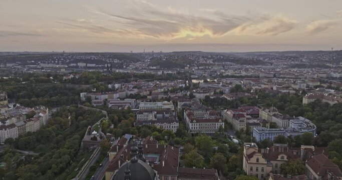 Prague Czechia Aerial v117 drone flyover Karla Velikeho church towards Vysehrad capturing Saints Peter and Paul Basilica and Smichov cityscape across the river - Shot with Mavic 3 Cine - November 2022